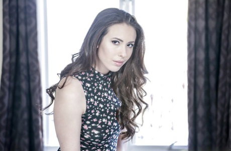 Amateur teen Casey Calvert stripping off black bra and panty set to model nude