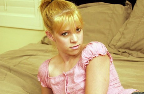 Flat-chested chick with braces Leah Luv can't wait to be fucked on the big bed