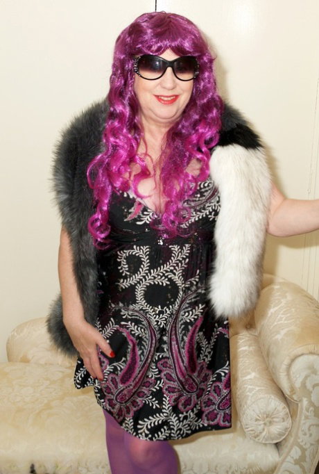 Purple haired hot granny frees saggy boobs & spreads legs to toy in pantyhose