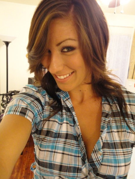 Sexy brunette Rilynn shows off her perfect tits & tan lines in bedroom strip