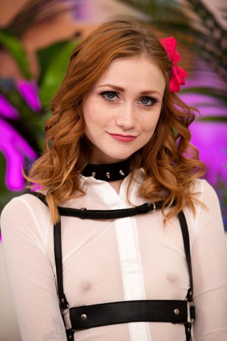 Beautiful redhead Scarlet Skies spreads her legs wide for a deep dicking