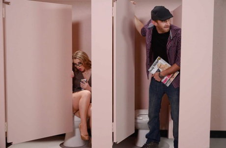 Blonde teacher in glasses sucks student's huge cock in school bathroom