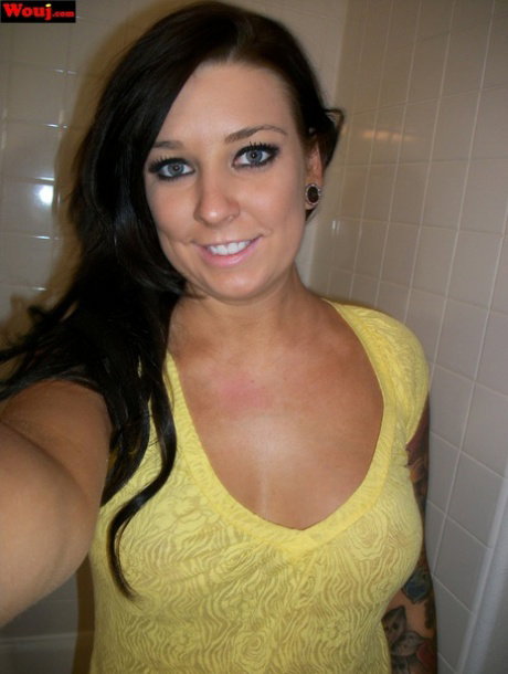 Brunette amateur WouJ shows her big booty in panties in the shower