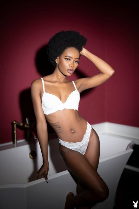 Glamorous babe Alicia undresses and washes herself in the bathtub