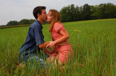 Young girl takes a cumshot on her tiny tits after sex in a field