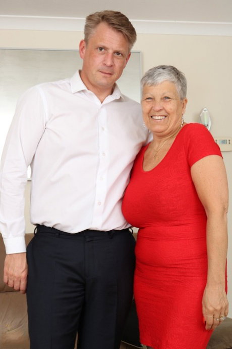Old British woman and her lover undress before fucking on a couch