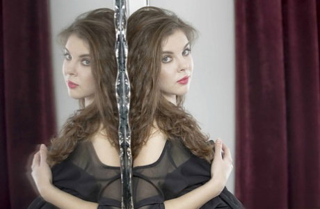 European beauty Dakota modeling naked in high heels after stripping