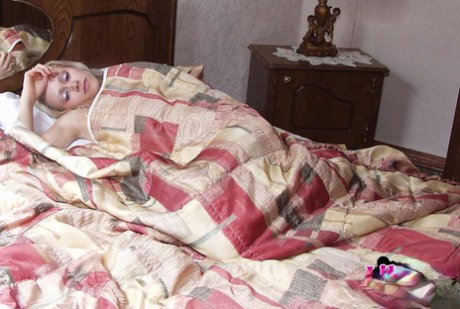 Sleeping blonde awakes to being penetrated by a couple of doctors