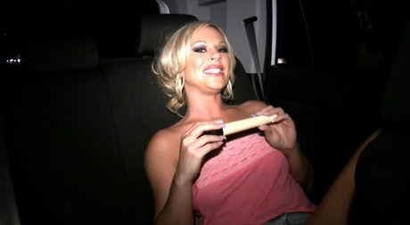 Blonde MILF Ahryan Astyn uncovers her big tits while masturbating with a toy