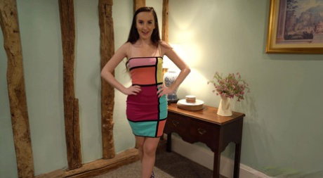 British MILF strips down to her garter belt and nylons during a solo show