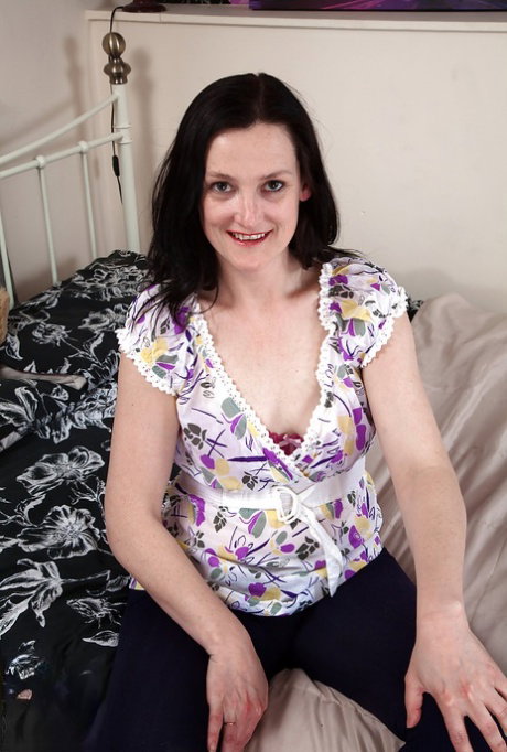 Clothed mature bitch Emily Marshall is opening wide her hairy furbox