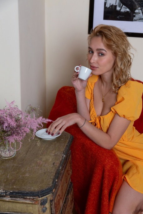 Pale teen Kelly Collins takes off her heels and yellow dress to go nude