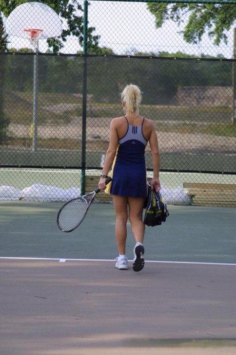 Amateur tennis player shows her amazing breasts & gives head on the court
