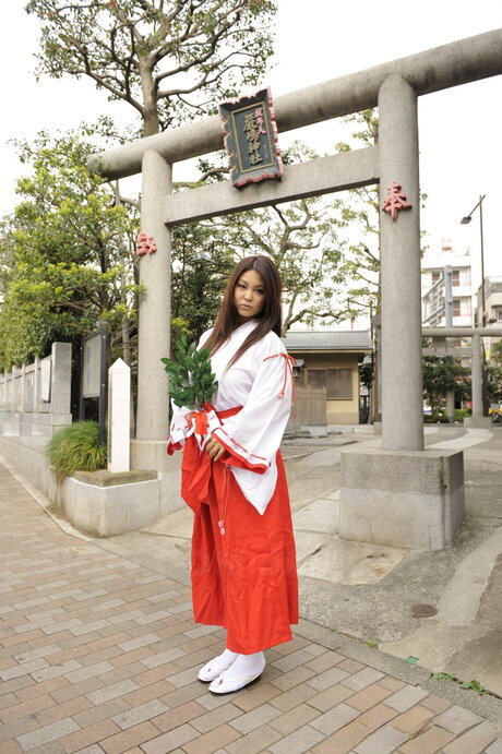 Japanese MILF Airi Ai exposes her upskirt pussy at a Shinto shrine