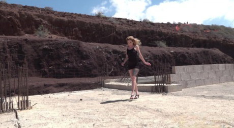 Blonde chick Aylin Tattoo takes a big piss at a construction site